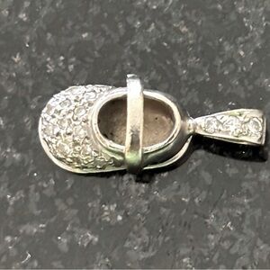 Pave diamond and  white gold and "baby bootie" pendant.